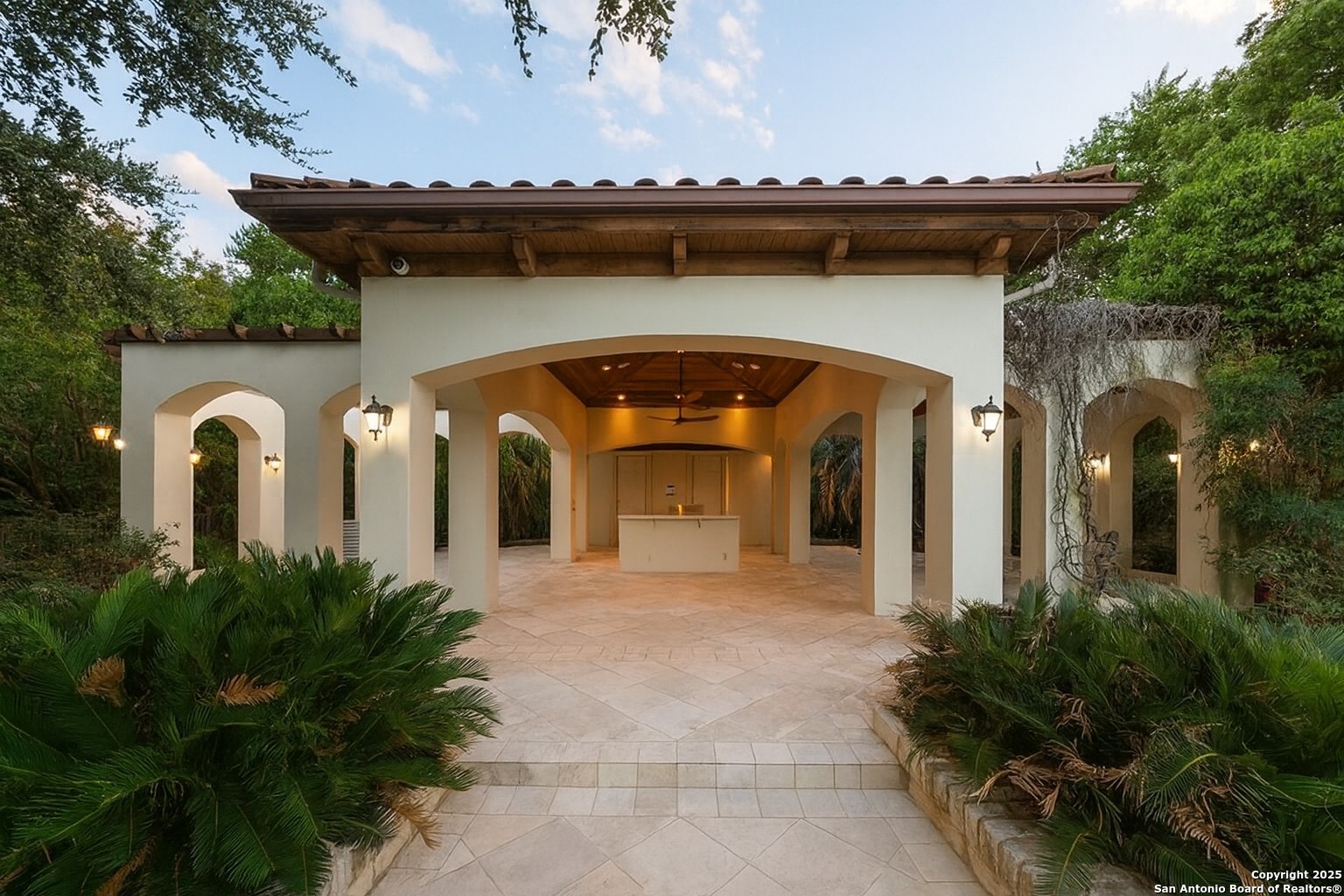 217 Bella Riva Drive Austin, TX 78734 - Photo 32 of 38 a front view of a house with a garden