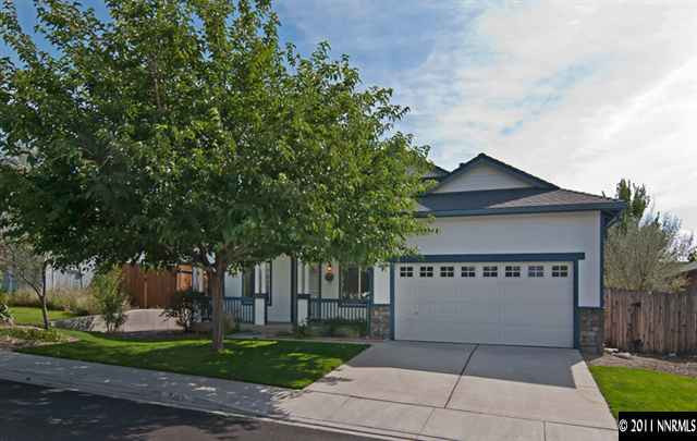 1462 Amston Road Reno, NV 89511 - Photo 1 of 13 a sign on the side of a building