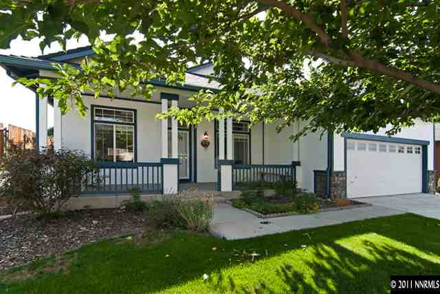 1462 Amston Road Reno, NV 89511 - Photo 2 of 13 a front view of a house with a yard