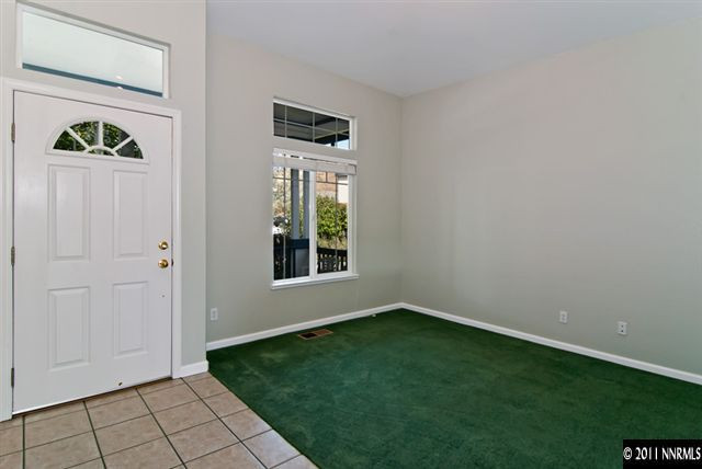1462 Amston Road Reno, NV 89511 - Photo 5 of 13 a view of an entryway with wooden floor