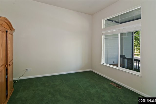 1462 Amston Road Reno, NV 89511 - Photo 6 of 13 an empty room with a window