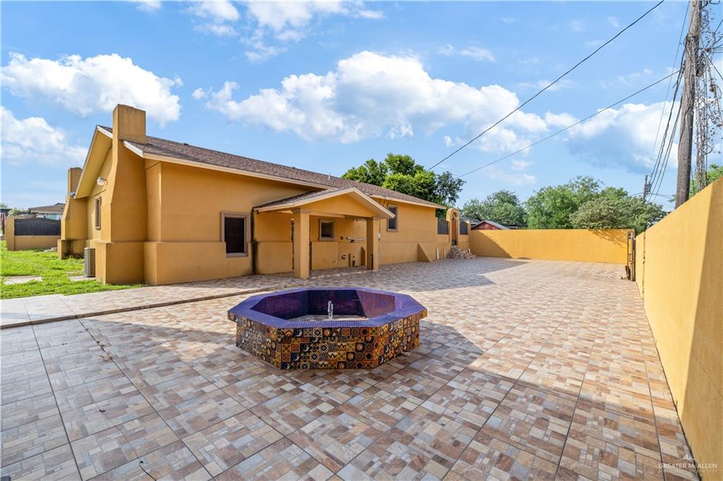610 North Texas Street Rio Grande City, TX 78582 - Photo 17 of 23 a backyard of a house with yard and outdoor seating