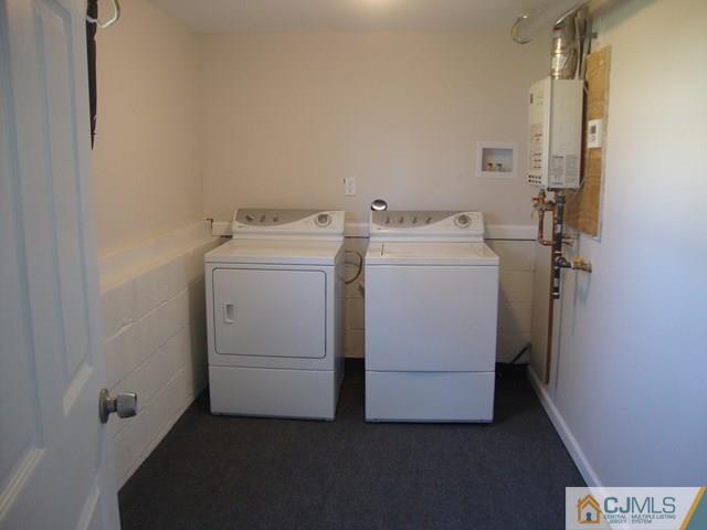 90 Westminster Road Colonia, NJ 07067 - Photo 22 of 25 a utility room with dryer and washer