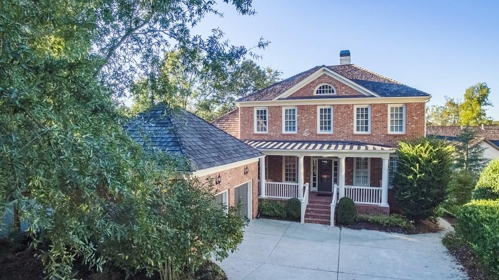 Southern Living front porch! Plenty of room for parking with all of this driveway space-a huge plus for a Vickery home!