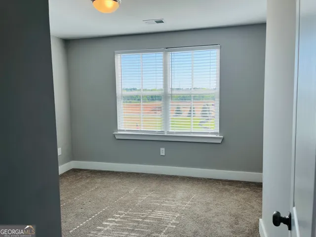a view of a livingroom with a window