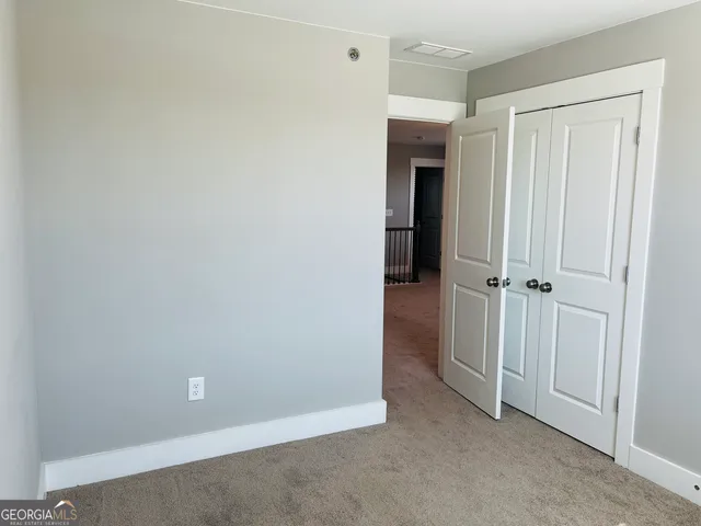 an empty room with closet