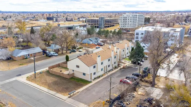 an aerial view of a city with ocean view