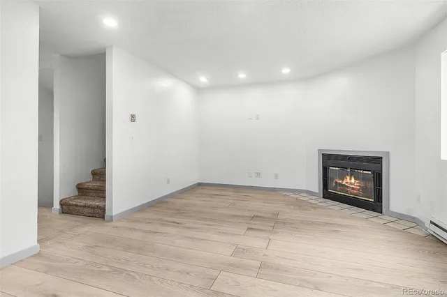 a view of a room with a hallway