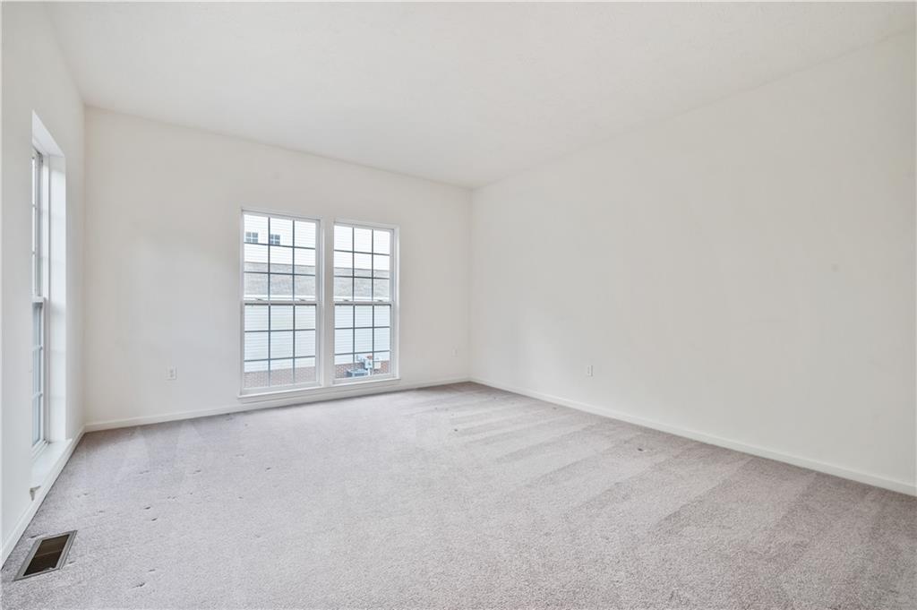 165 Ridge Avenue Pittsburgh, PA 15237 - Photo 4 of 24 an empty room with windows