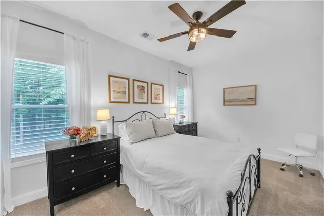 a en suite bathroom with a sink and a mirror