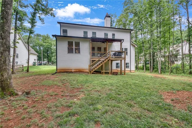 a front view of a house with stairs