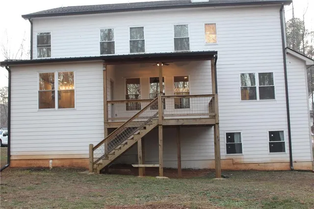 a front view of a house with garage