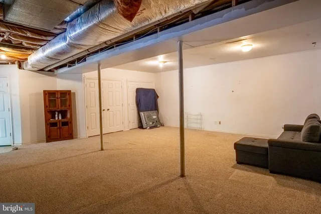 a view of a livingroom with a furniture