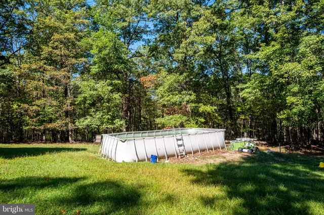 a view of a balcony with chairs