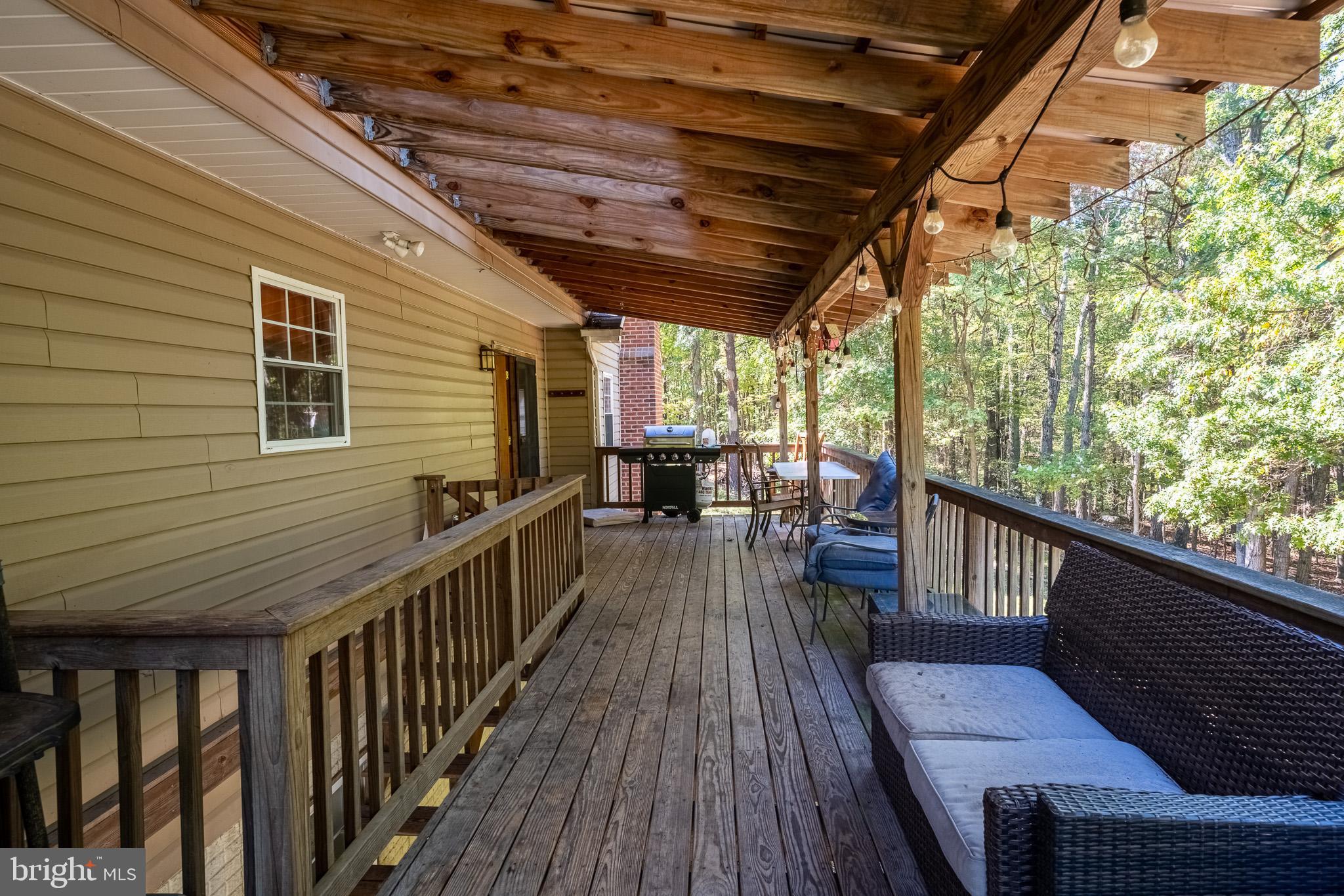 3931 Trego Mountain Road Keedysville, MD 21756 - Photo 6 of 26 a view of a balcony with chairs