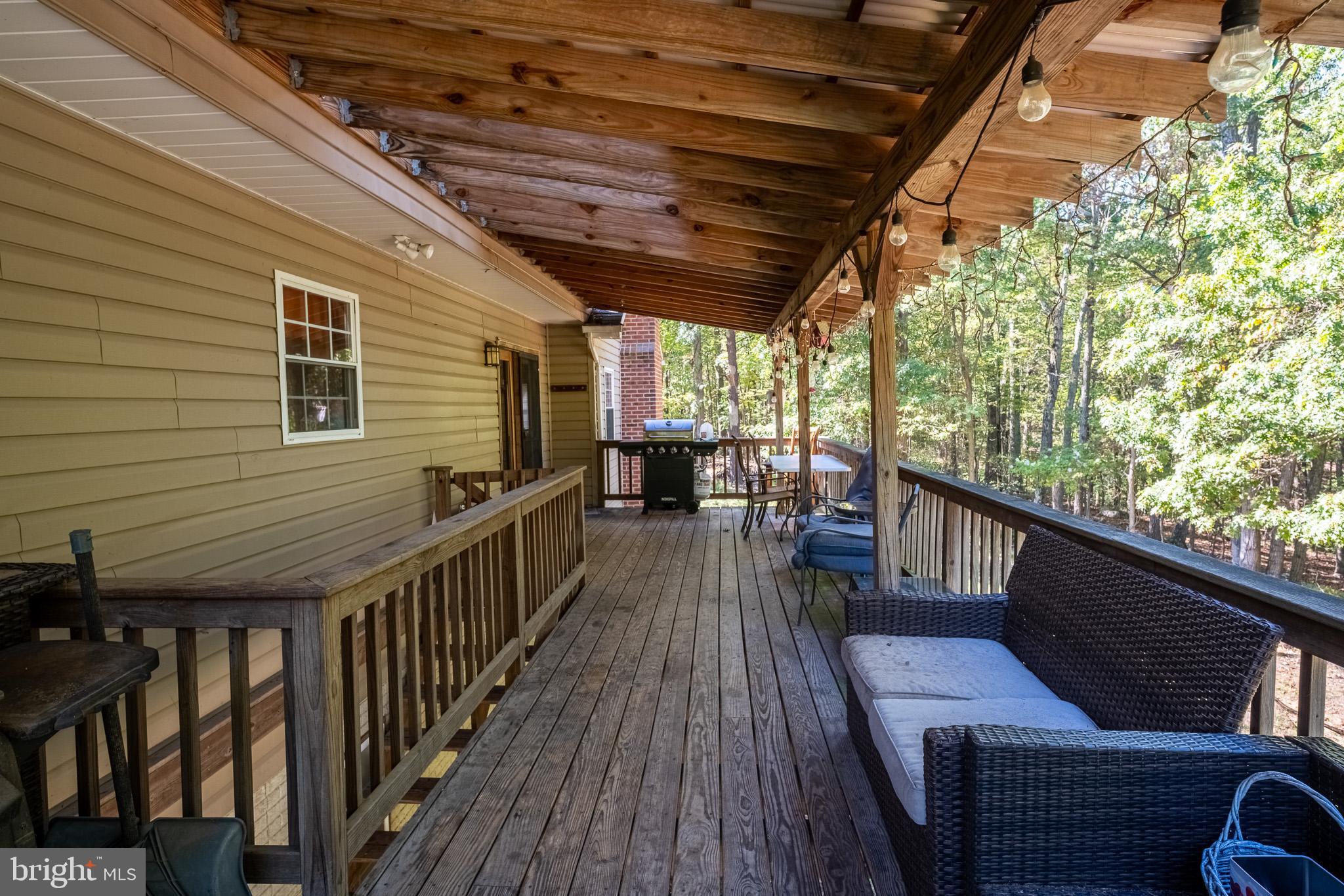 3931 Trego Mountain Road Keedysville, MD 21756 - Photo 7 of 26 a view of a balcony with chairs