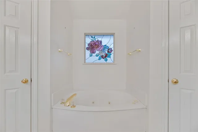 a bathroom with a bathtub