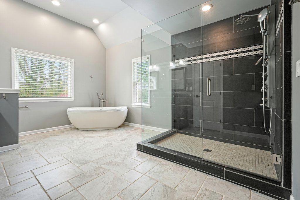 4110 Providence Square Alpharetta, GA 30009 - Photo 27 of 73 a bathroom with a tub and a shower