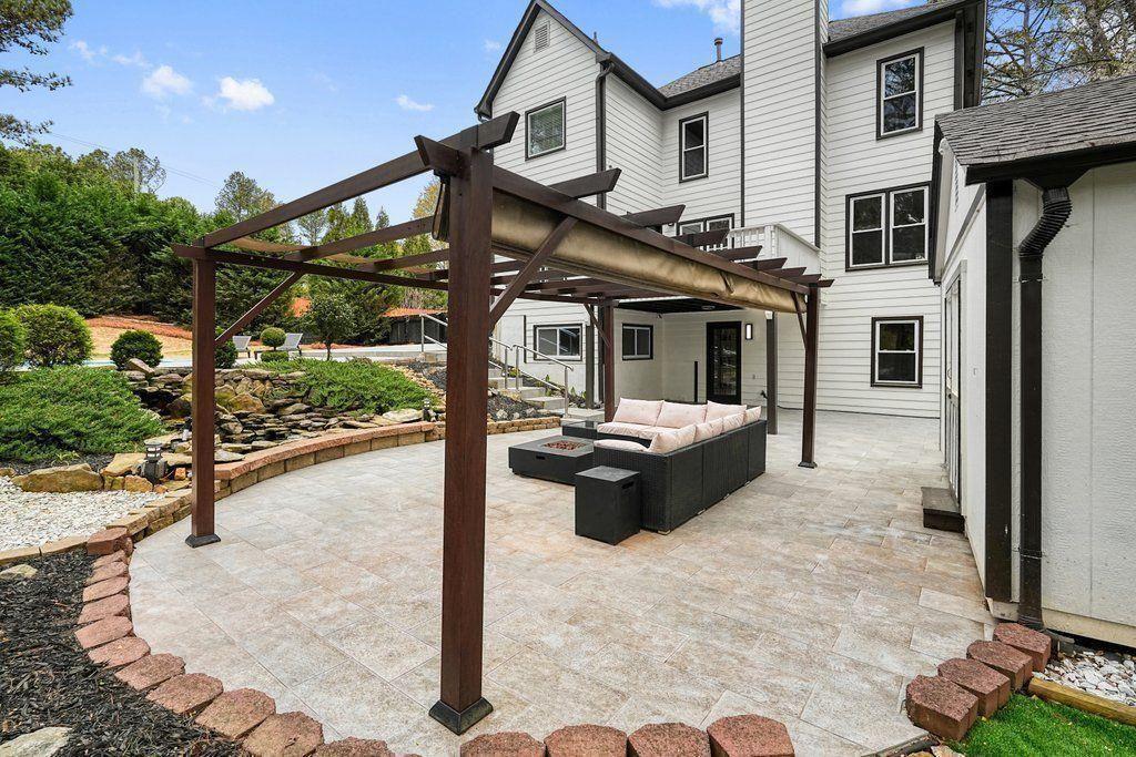 4110 Providence Square Alpharetta, GA 30009 - Photo 62 of 73 a view of a house with backyard and sitting area