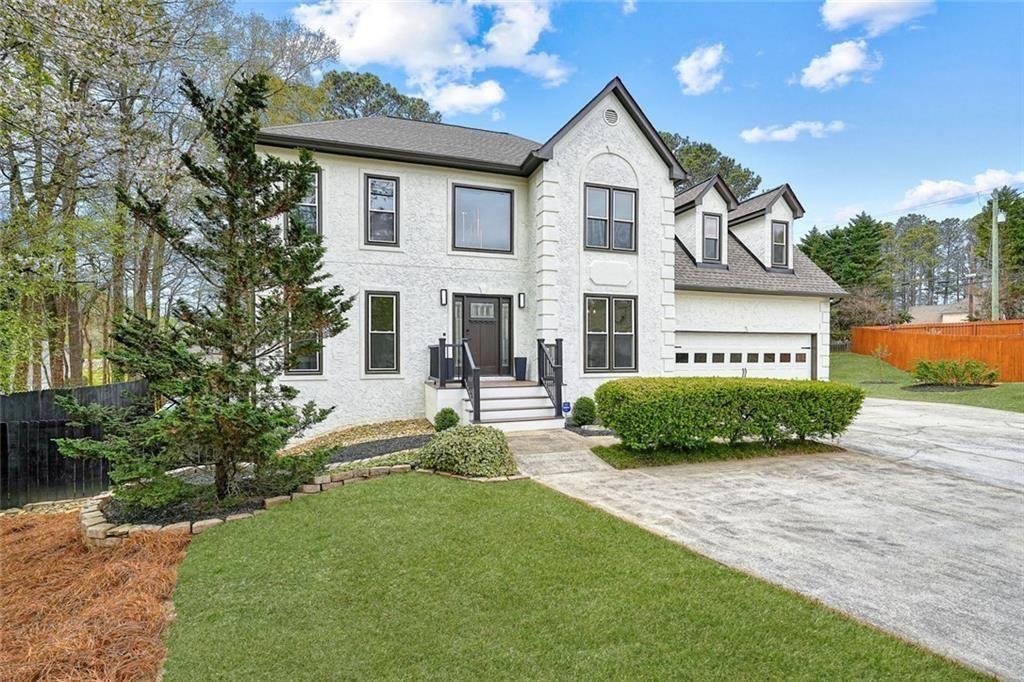 4110 Providence Square Alpharetta, GA 30009 - Photo 68 of 73 a view of a house with a yard