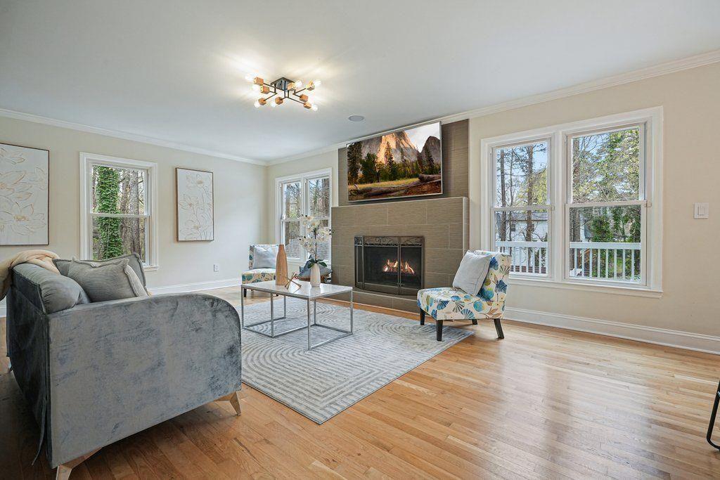4110 Providence Square Alpharetta, GA 30009 - Photo 9 of 73 a living room with furniture and a fireplace