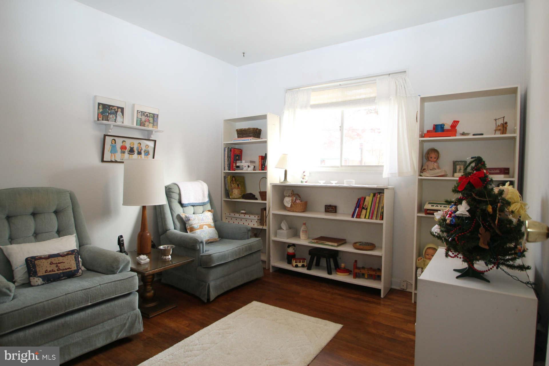 3811 Kayson Street Silver Spring, MD 20906 - Photo 12 of 30 a living room with furniture and a window