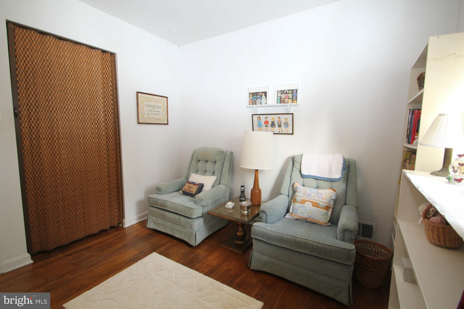 3811 Kayson Street Silver Spring, MD 20906 - Photo 13 of 30 a living room with furniture and a window