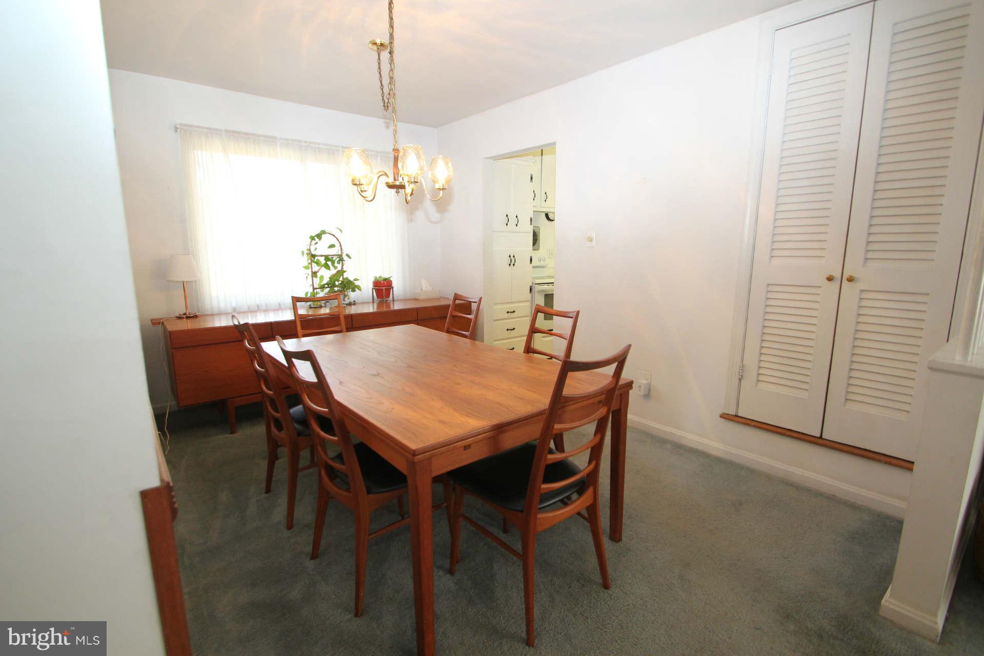 3811 Kayson Street Silver Spring, MD 20906 - Photo 5 of 30 a view of a dining room with furniture and wooden floor