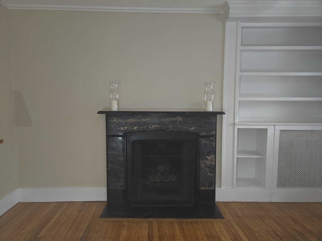 75 Charles Street, Unit 4B Boston, MA 02114 - Photo 4 of 14 a room with a fireplace