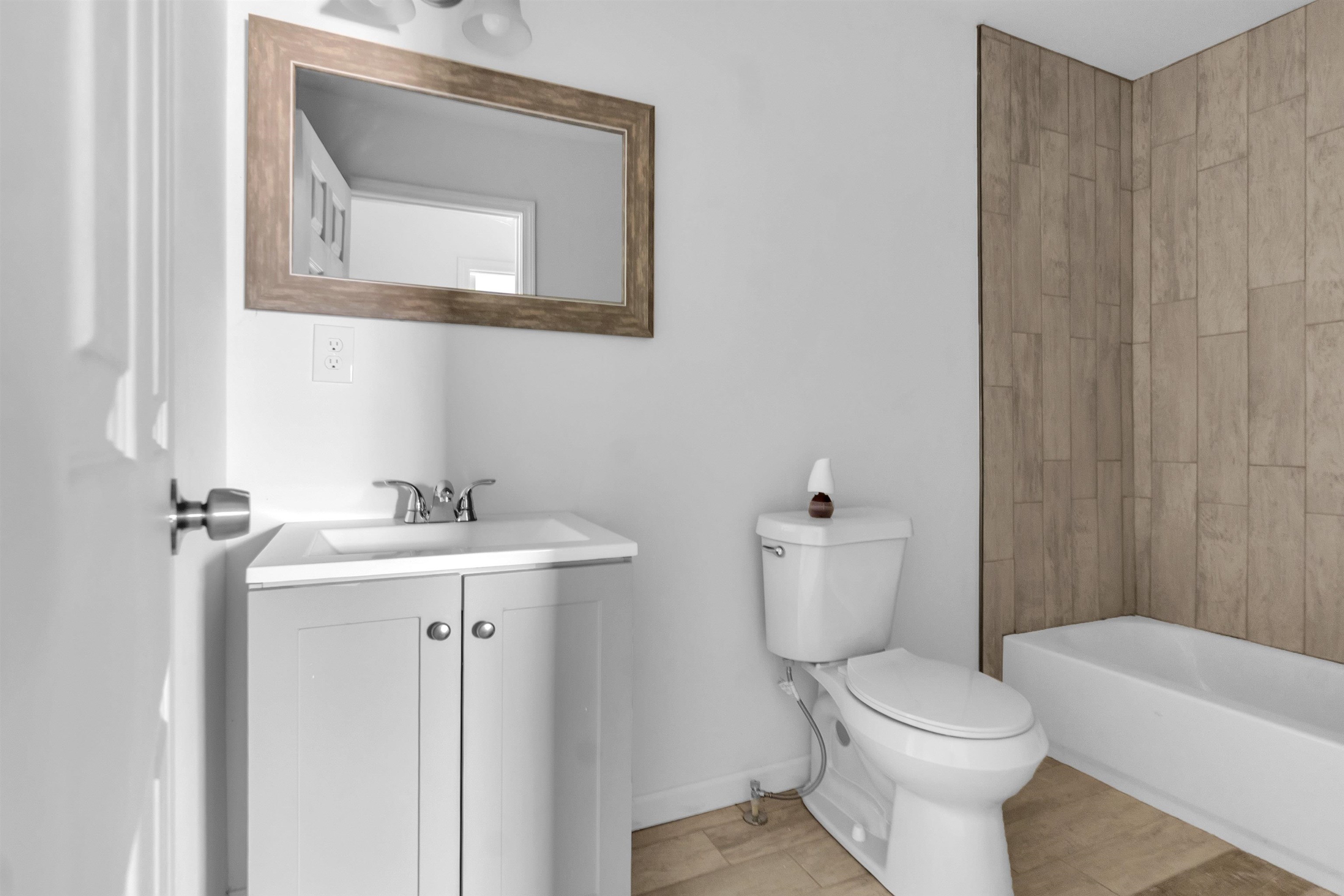 3021 Chelsea Avenue Memphis, TN 38108 - Photo 13 of 17 Bathroom with vanity and tub / shower combination