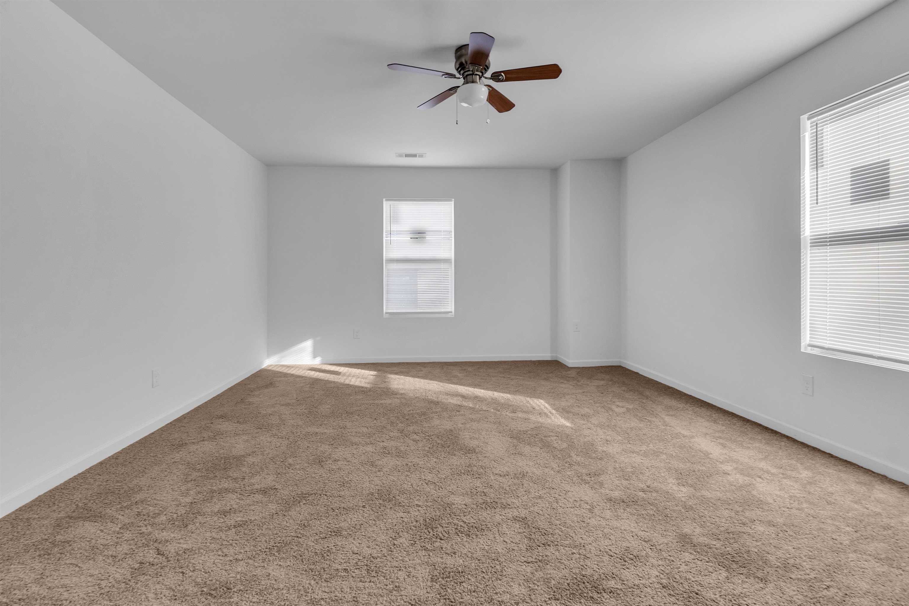 3021 Chelsea Avenue Memphis, TN 38108 - Photo 15 of 17 Unfurnished room featuring light carpet and a ceiling fan