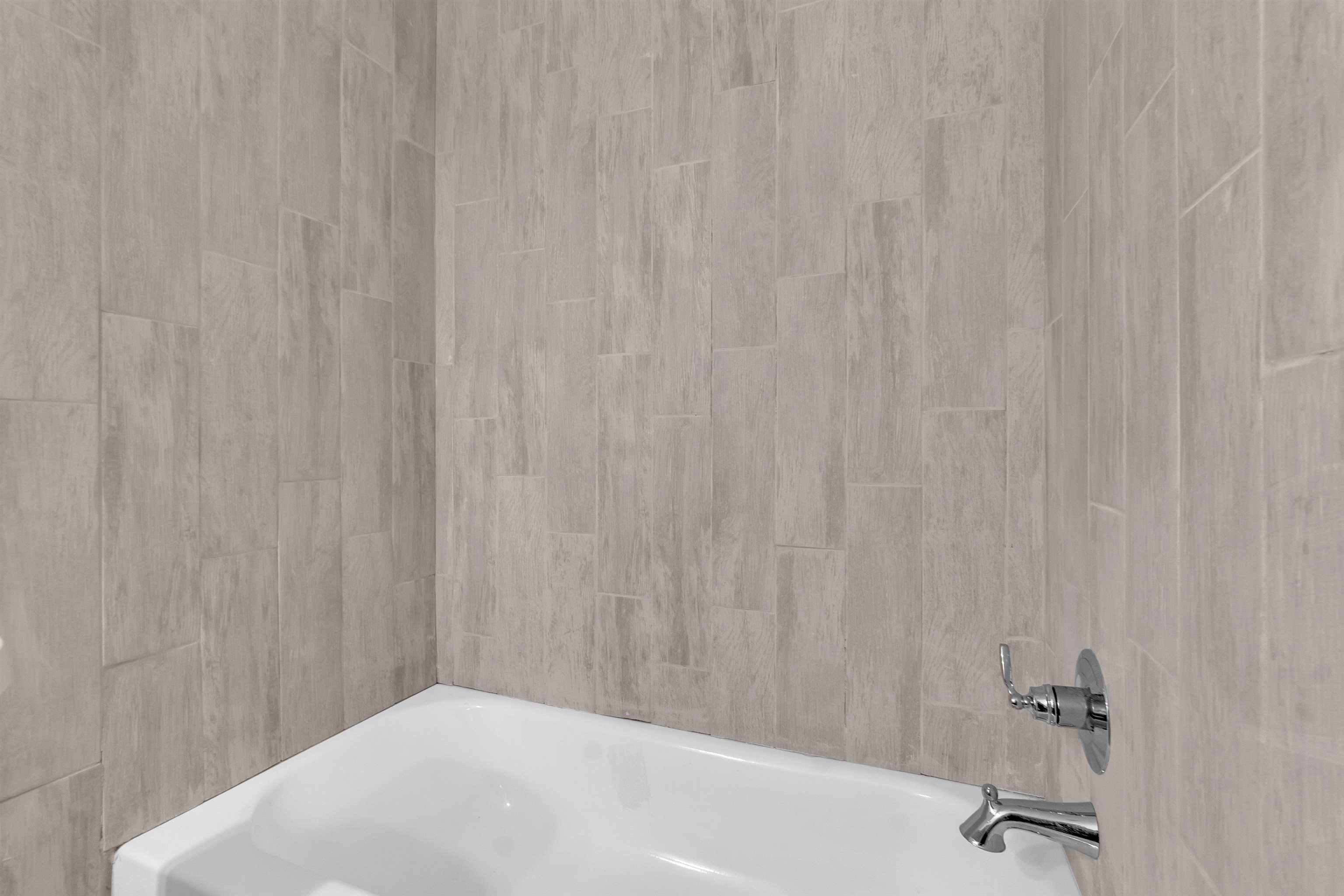 3021 Chelsea Avenue Memphis, TN 38108 - Photo 7 of 17 Bathroom view of bathtub / shower combination