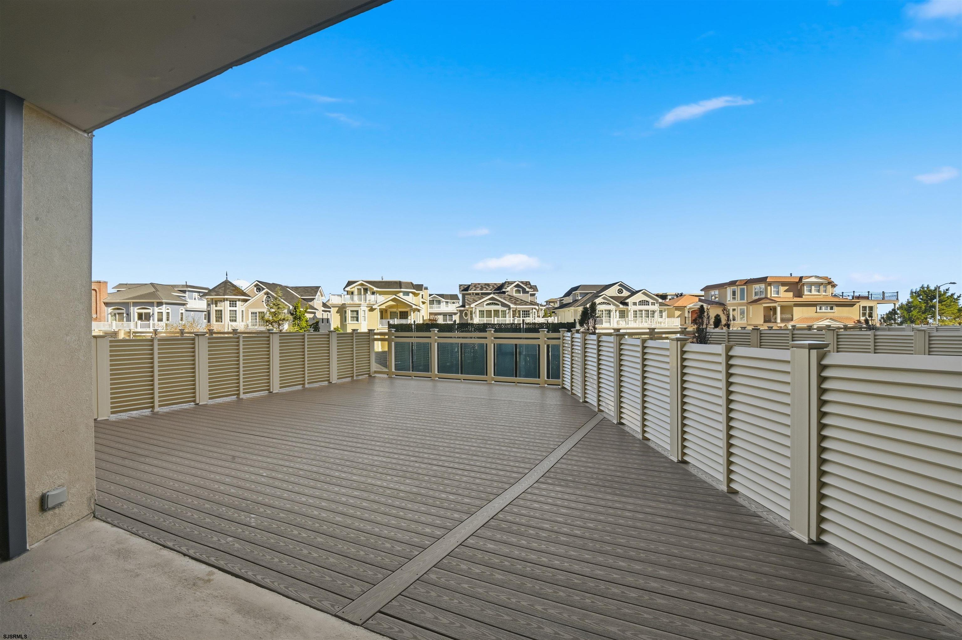 2700 Atlantic Avenue, Unit 209 Longport, NJ 08403 - Photo 15 of 31 a view of a balcony with an ocean