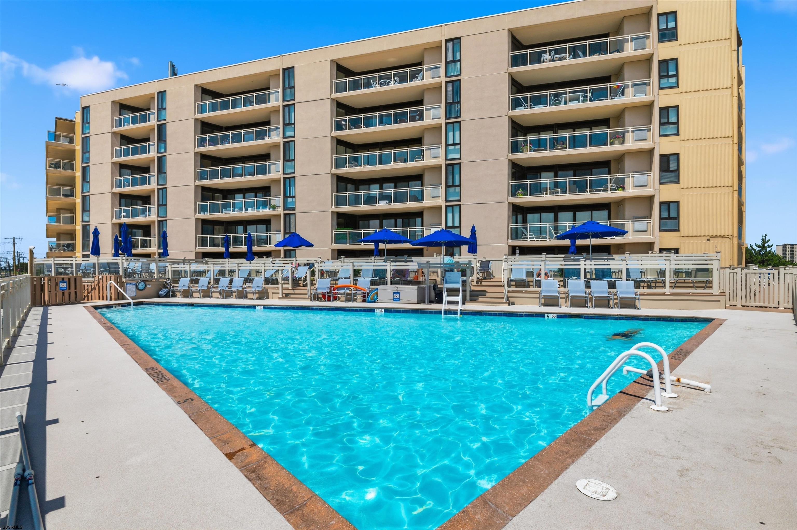 2700 Atlantic Avenue, Unit 209 Longport, NJ 08403 - Photo 24 of 31 a view of swimming pool with outdoor seating