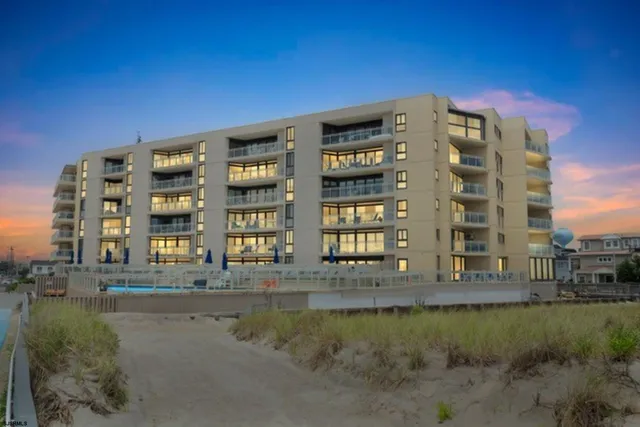 a front view of a building with balcony