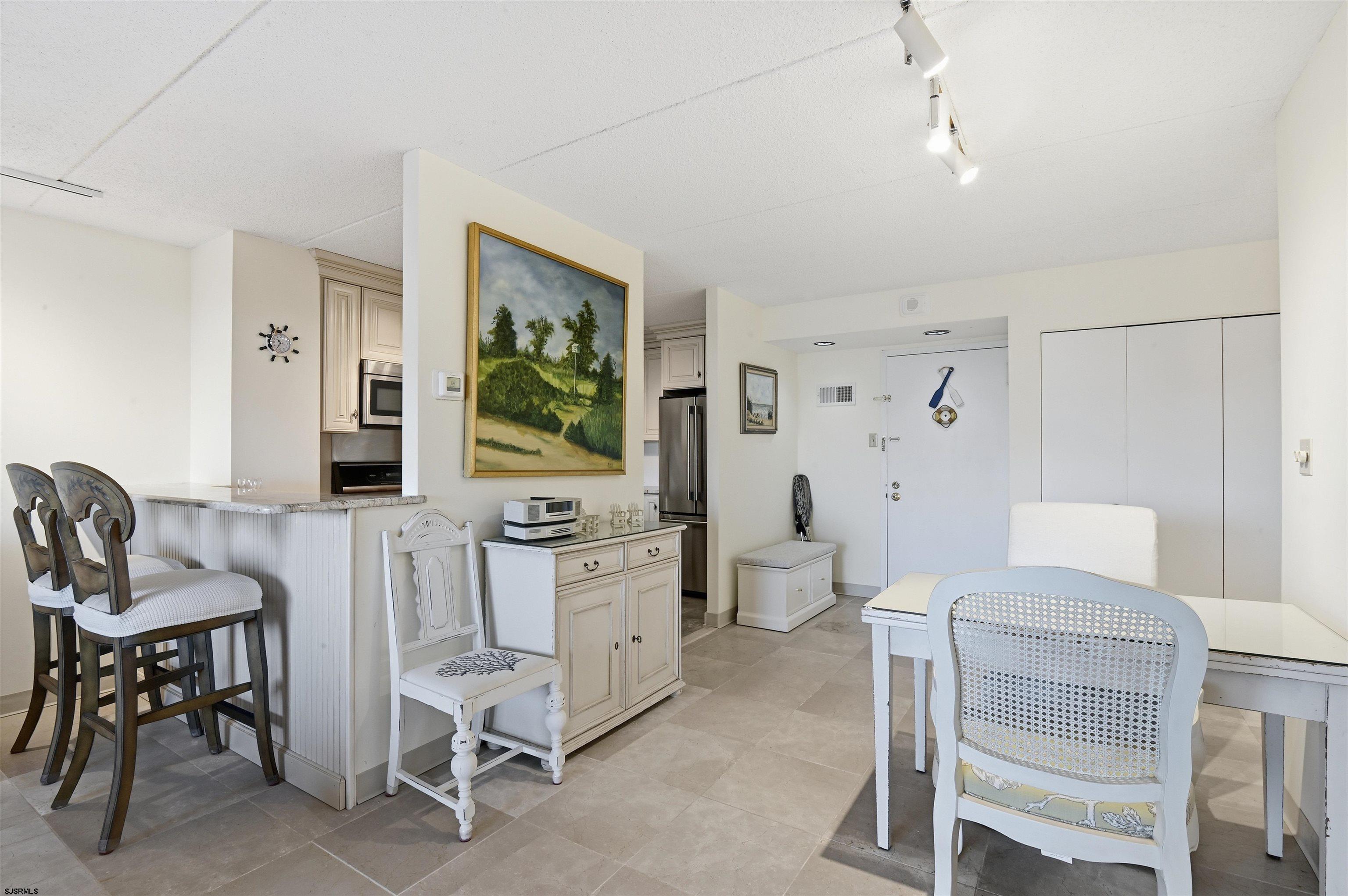 2700 Atlantic Avenue, Unit 209 Longport, NJ 08403 - Photo 9 of 31 a room with furniture and window