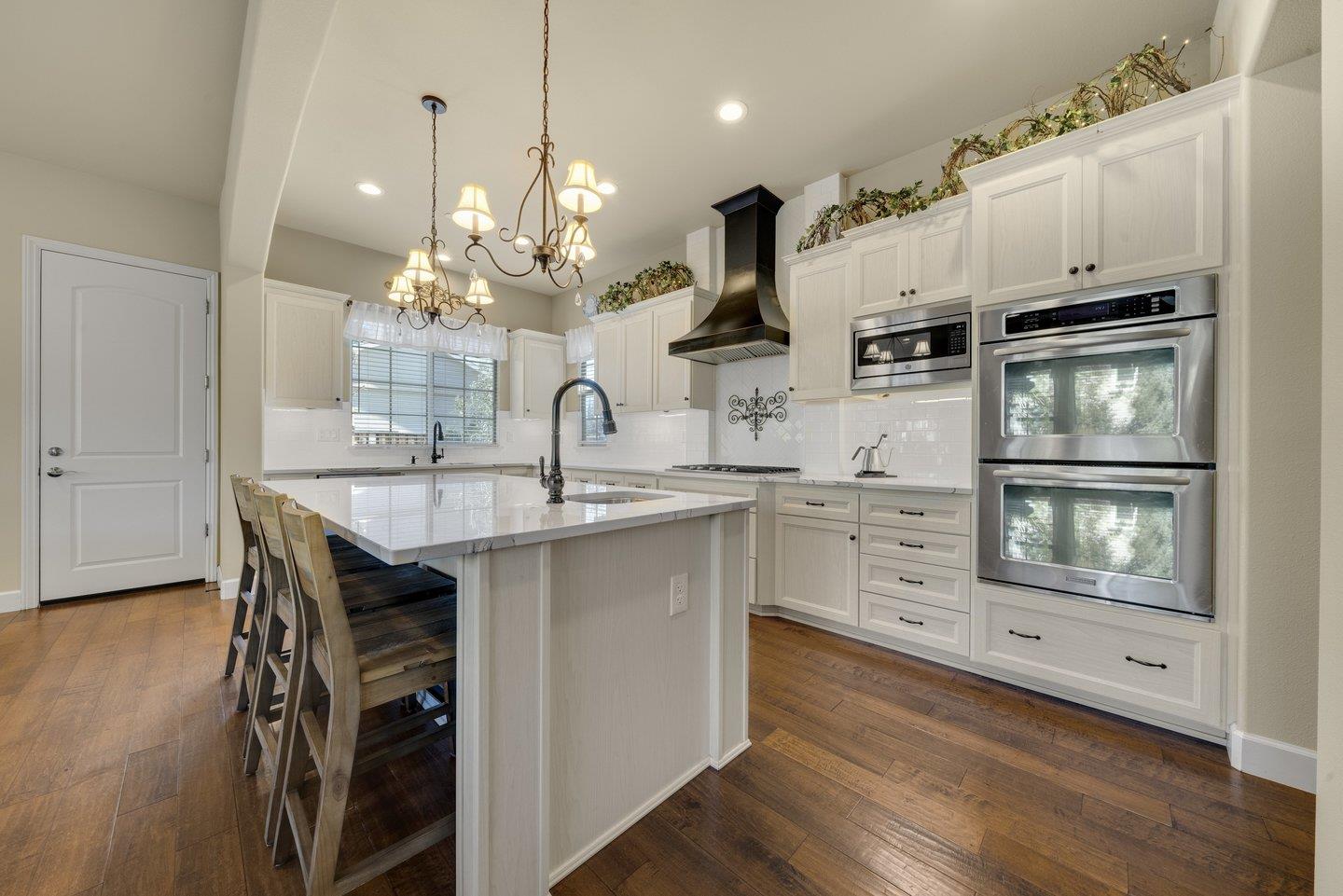 3943 Vía Cristobal Campbell, CA 95008 - Photo 11 of 59 a kitchen with stainless steel appliances a sink stove and refrigerator