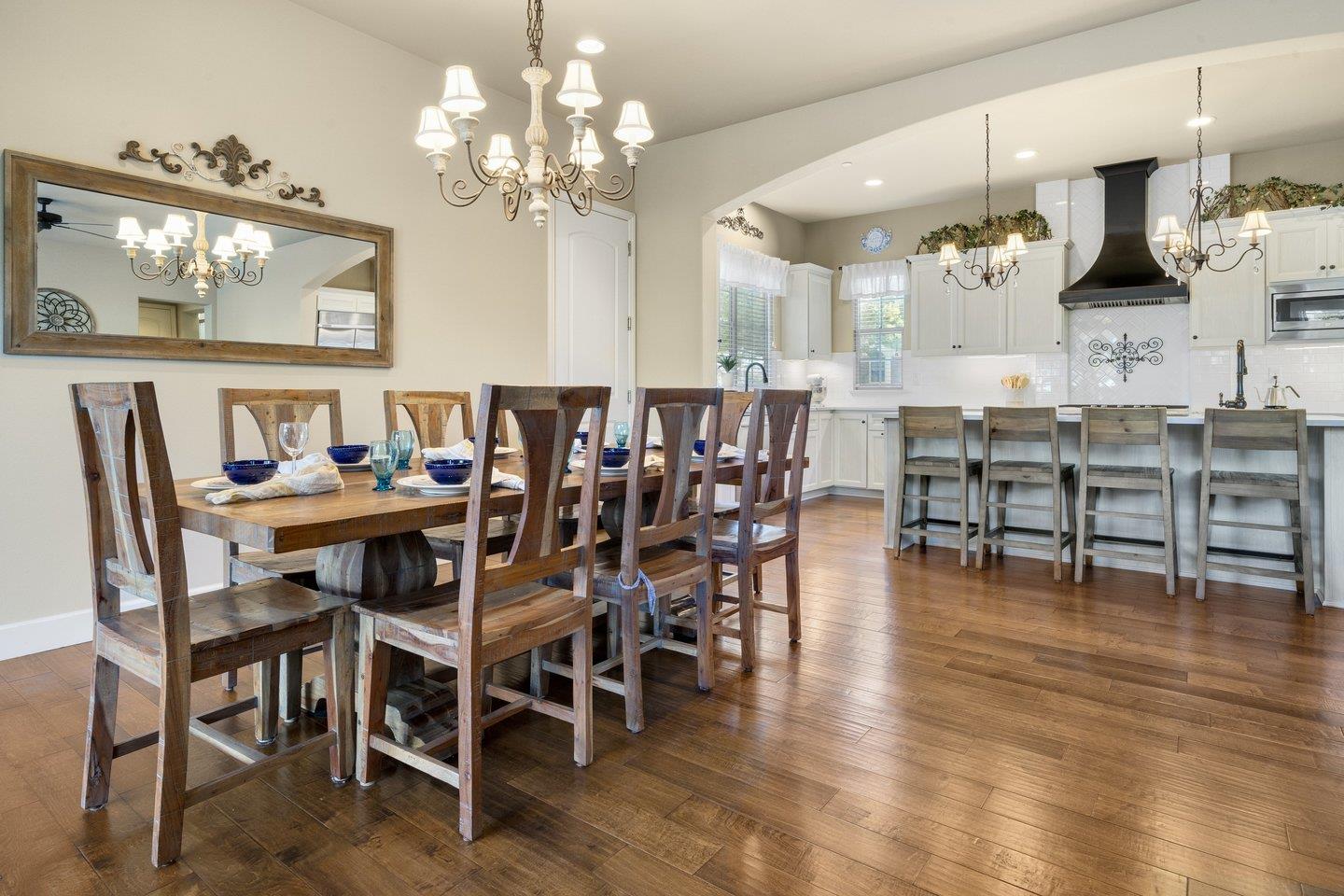 3943 Vía Cristobal Campbell, CA 95008 - Photo 19 of 59 a view of a dining room with furniture and wooden floor