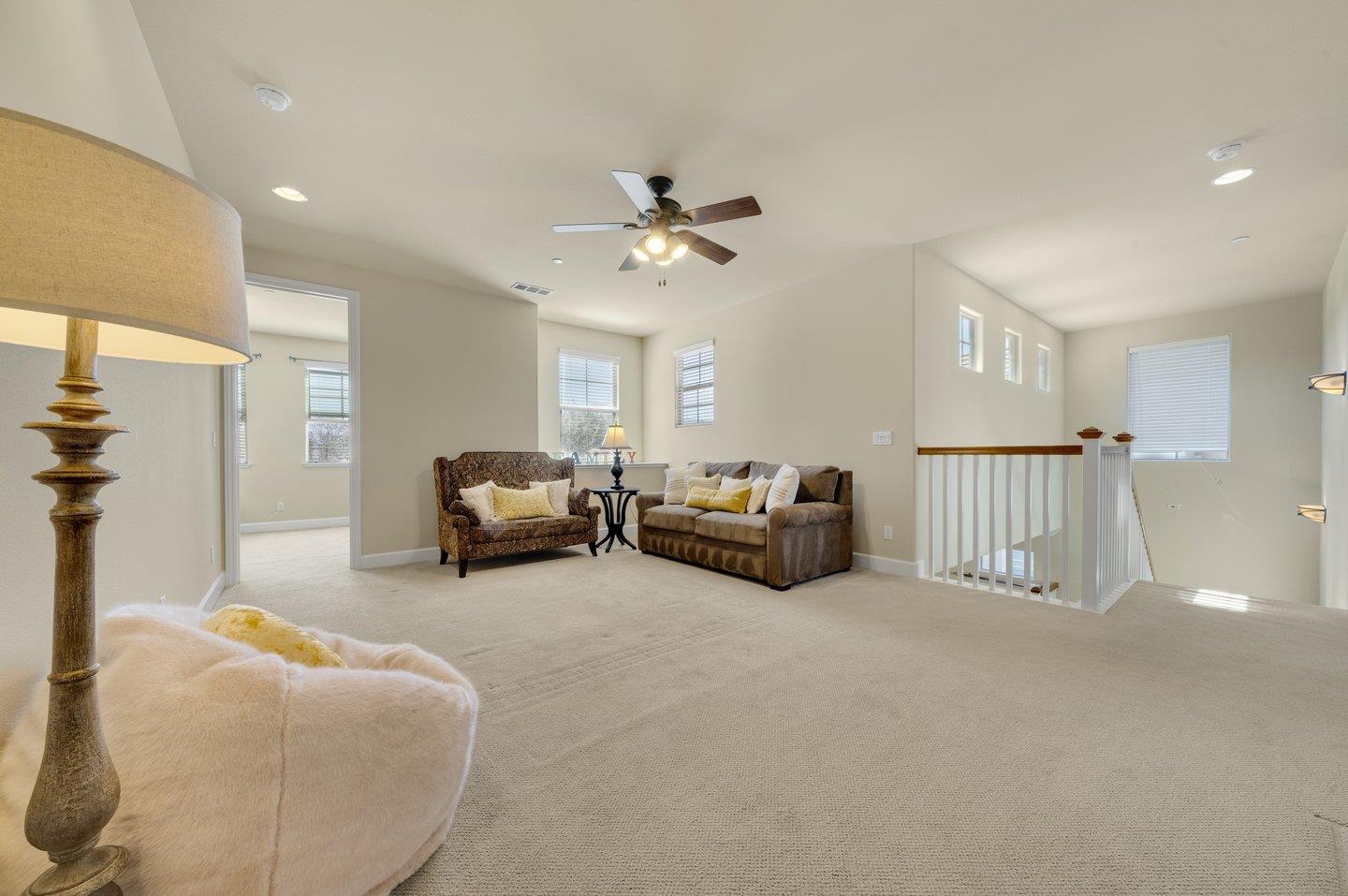 3943 Vía Cristobal Campbell, CA 95008 - Photo 30 of 59 a bed room with furniture and a ceiling fan