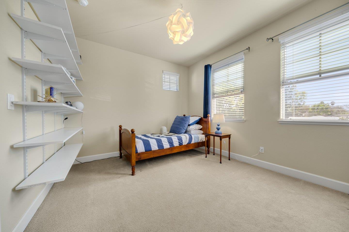 3943 Vía Cristobal Campbell, CA 95008 - Photo 33 of 59 a bedroom with furniture and a window