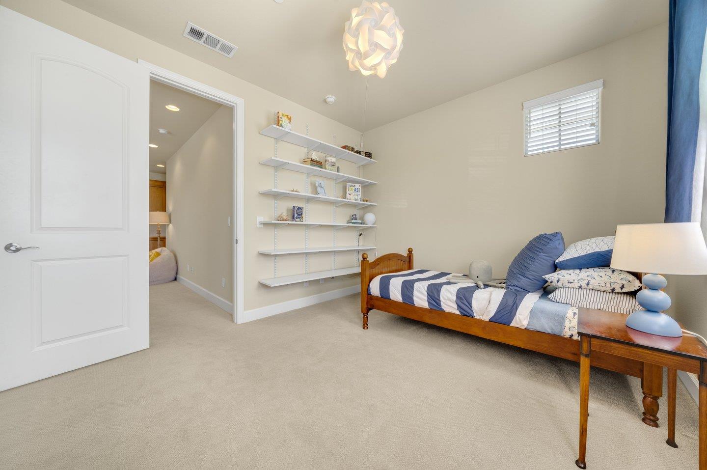 3943 Vía Cristobal Campbell, CA 95008 - Photo 34 of 59 a living room with furniture and a chandelier