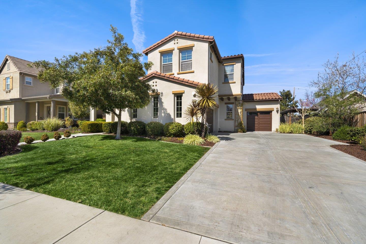 3943 Vía Cristobal Campbell, CA 95008 - Photo 4 of 59 a front view of a house with a yard