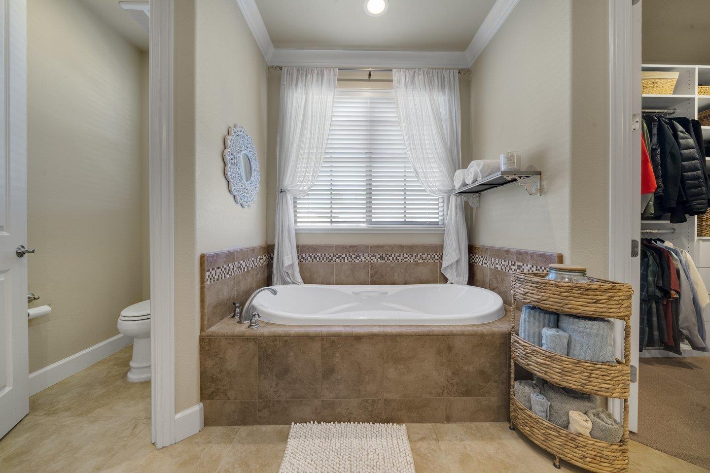 3943 Vía Cristobal Campbell, CA 95008 - Photo 46 of 59 a bathroom with a granite countertop sink a toilet and a bathtub