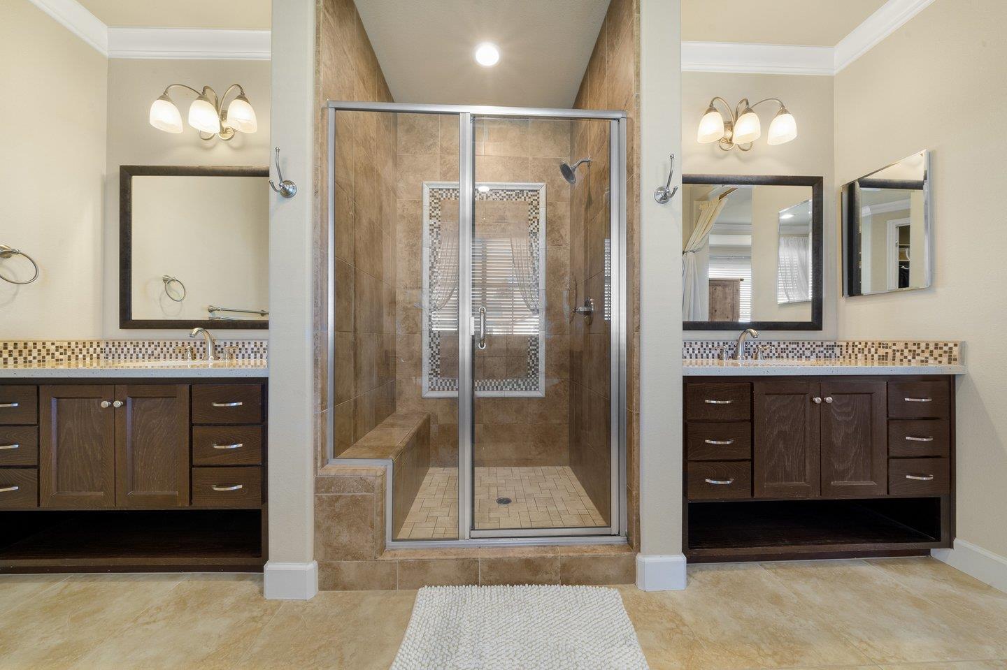 3943 Vía Cristobal Campbell, CA 95008 - Photo 47 of 59 a bathroom with a granite countertop sink mirror and a shower