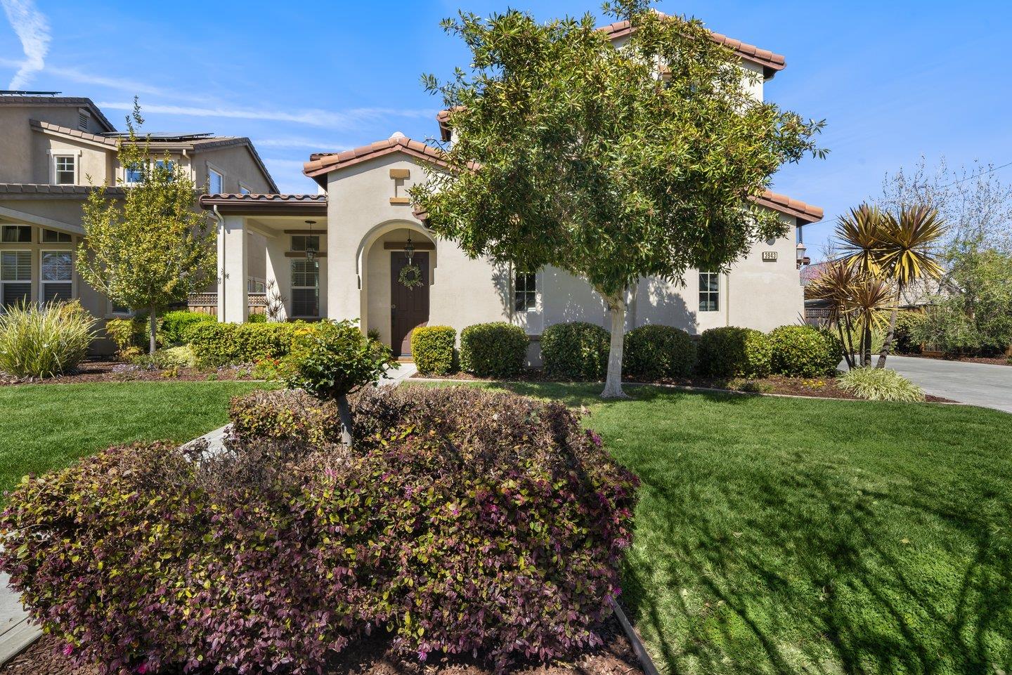 3943 Vía Cristobal Campbell, CA 95008 - Photo 5 of 59 a front view of a house with garden