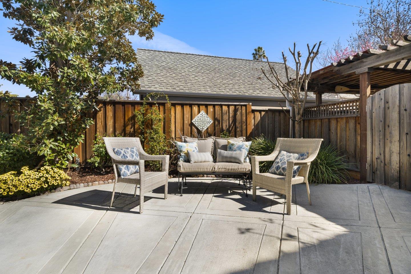 3943 Vía Cristobal Campbell, CA 95008 - Photo 57 of 59 a view of backyard with outdoor seating and wooden fence
