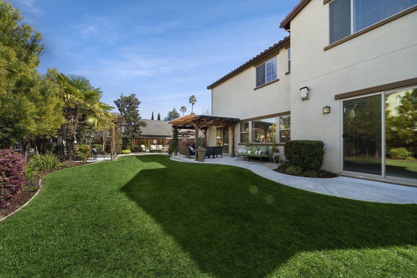 3943 Vía Cristobal Campbell, CA 95008 - Photo 59 of 59 a view of an house with backyard space and sitting area