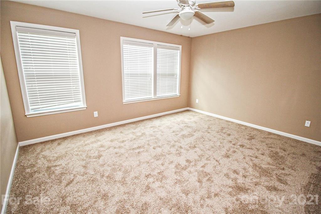 7042 Meyer Road Fort Mill, SC 29715 - Photo 17 of 18 a view of an empty room with a window