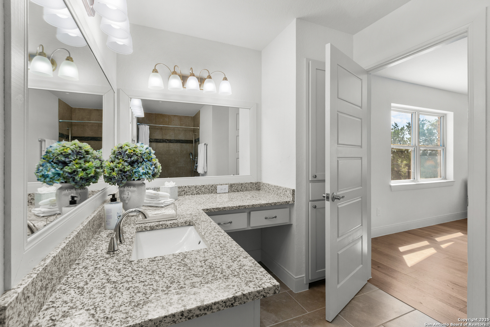 935 Spring Branch Road Spring Branch, TX 78070 - Photo 17 of 48 a bathroom with a tub sink and mirror