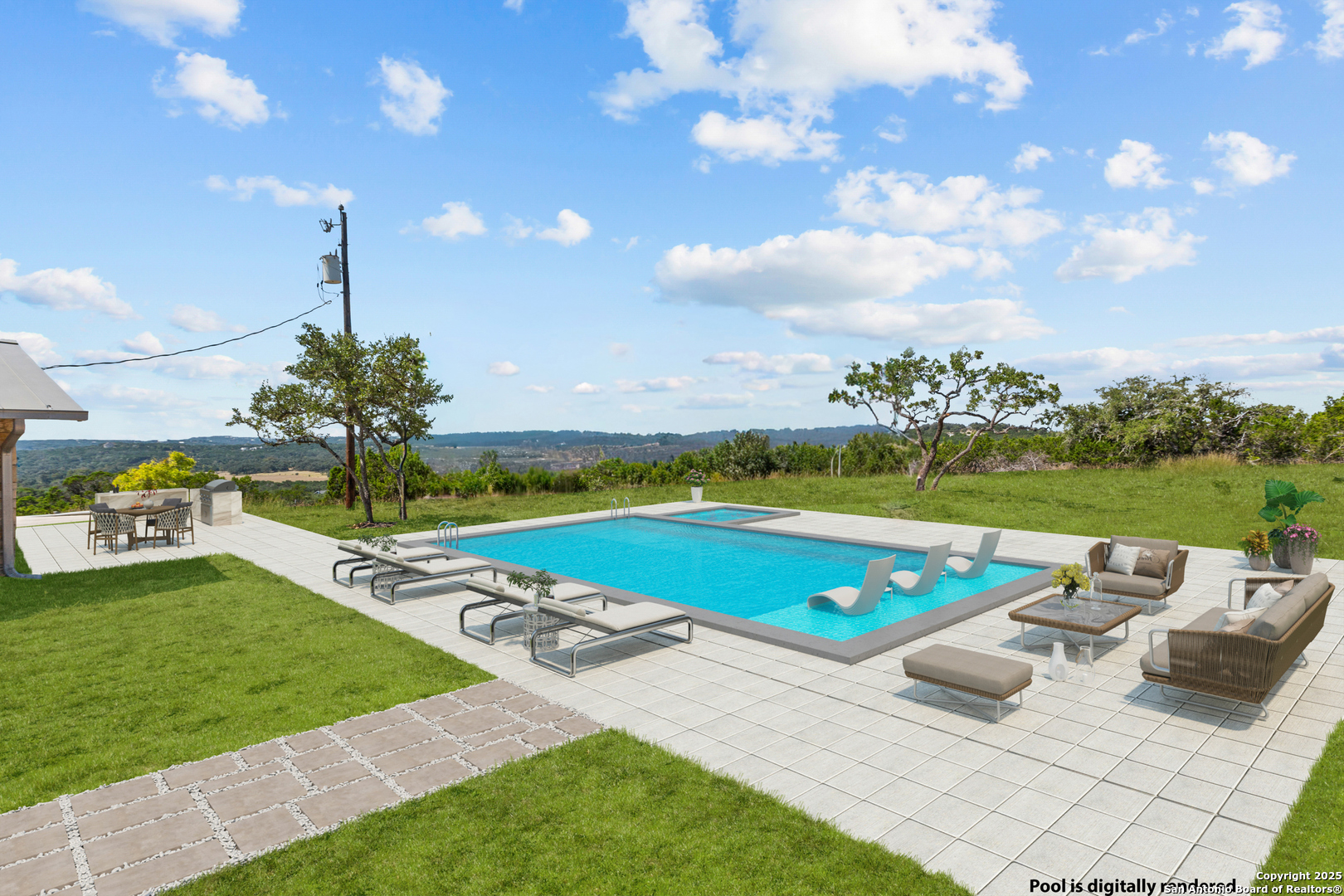 935 Spring Branch Road Spring Branch, TX 78070 - Photo 28 of 48 a view of a swimming pool and lounge chairs in back yard of the house